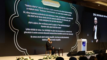 Stage setup with green backdrop displaying Arabic text quotes and white decorative borders man in suit and cap seated at table with microphone another image shows blue stage with 20 Turkiye Bulusmasi banner flags podium with Mesut oner text man in red white vest speaking at podium with flowers below third image depicts row of formally dressed men and women some in vests headscarves seated in auditorium with banners for Istanbul Adana Adiyaman branches and Turkish flags fourth image shows similar group of attendees clapping hands raised in applause with banners for Istanbul Adana Adiyaman branches flowers on table.
