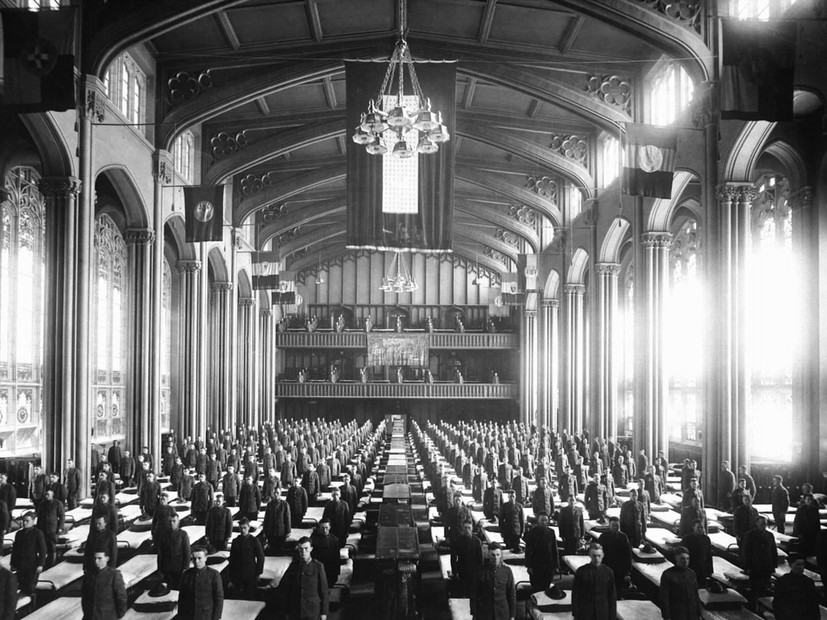 fold3's tweet image. The Great Hall (part of the City College of New York) was home to the Signal Corps School of Radio and Multiplex Telegraphy in 1918. The soldiers were learning the rapidly advancing field of wireless communications. f3.social/6yb9