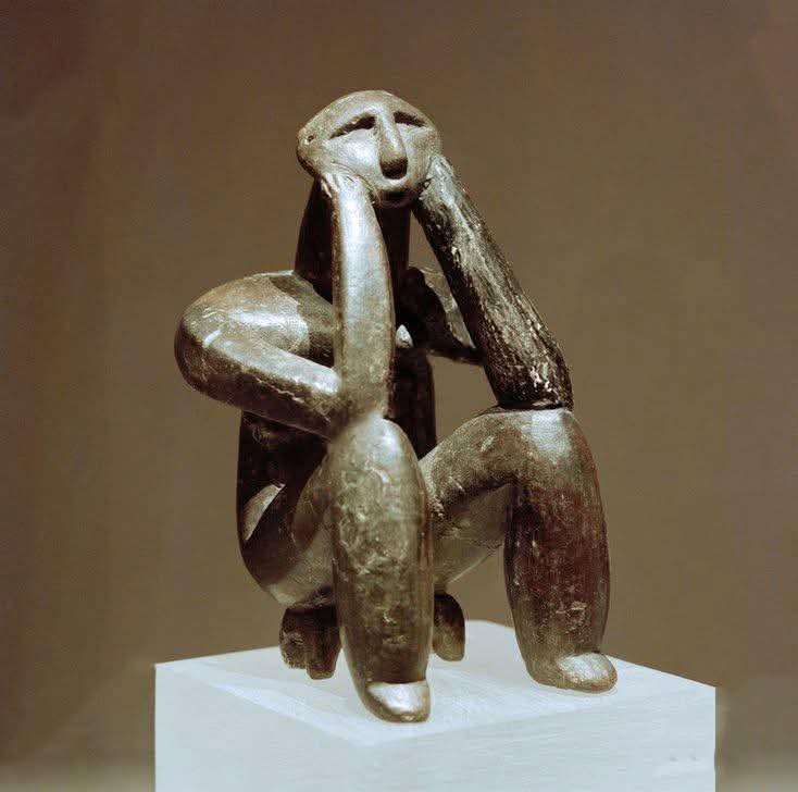 The Thinker of Hamangia - Hamangia Culture (5000–4600 BC), Cernavodă, Dobruja region, Romania 🇷🇴

The Thinker of Hamangia is a small, anthropomorphic clay figurine about 12cm tall, showing a seated male figure with elbows resting on knees and hands supporting the chin — in a