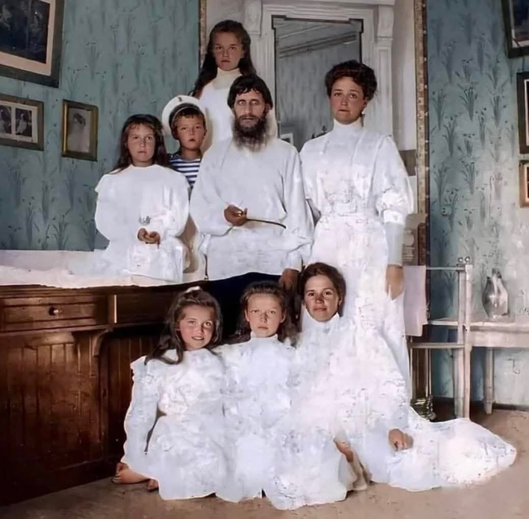This rare, colorized image from 1908 captures Grigori Rasputin with Empress Alexandra Feodorovna and her children, the last royal family of Imperial Russia. Known as the Romanovs, they lived in a world of splendor and isolation as the Russian Empire teetered on the edge of