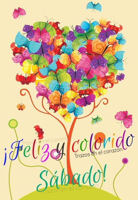 A whimsical tree with a trunk curving into a heart shape, covered in numerous colorful butterflies in shades of red, blue, purple, yellow, and green, some flying around the branches. The background is a pale yellow with scattered green dots resembling leaves or buds. At the base, green grass and small flowers frame the scene, with a small orange sun visible. Spanish text Feliz sabado! Feliz y colorido! Trazo en el corazon overlays the image in playful multicolored letters.
