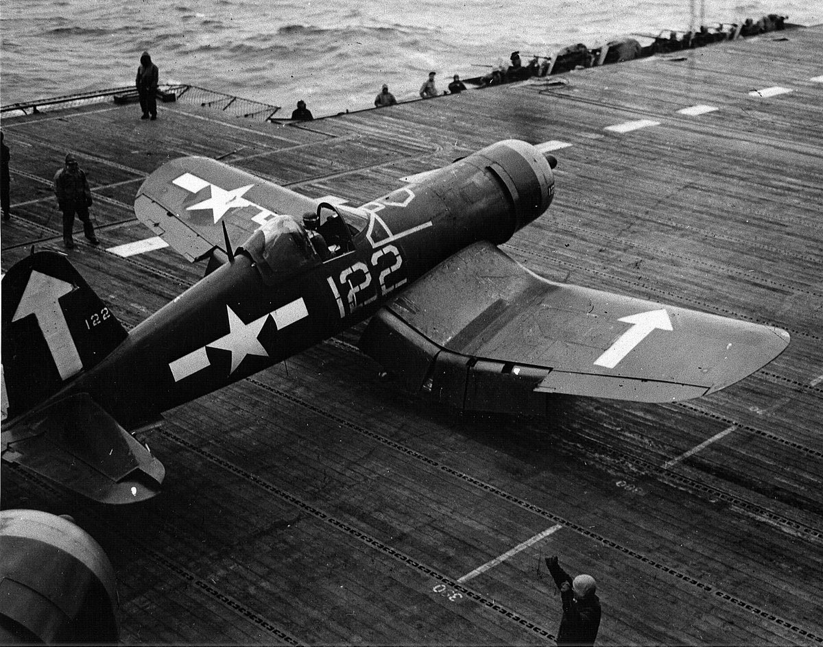 F4U-1D Corsair on the flight deck of USS Bunker Hill in the Pacific Ocean off Okinawa, Japan, 6 May 1945