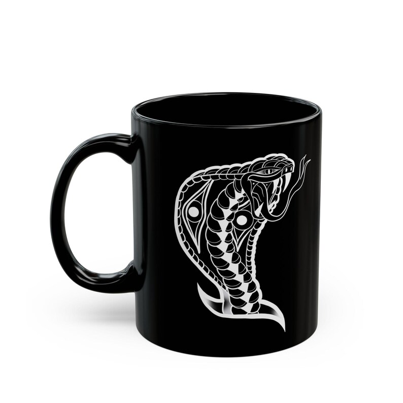 SplattooTattoo's tweet photo. coffee mug with cobra tattoo design unique gift idea for tattoo artist or tattoo lover cool snake art ceramic cup for ink enthusiasts
https://t.co/EtOuTfWtH3 https://t.co/7a76xGpdCo