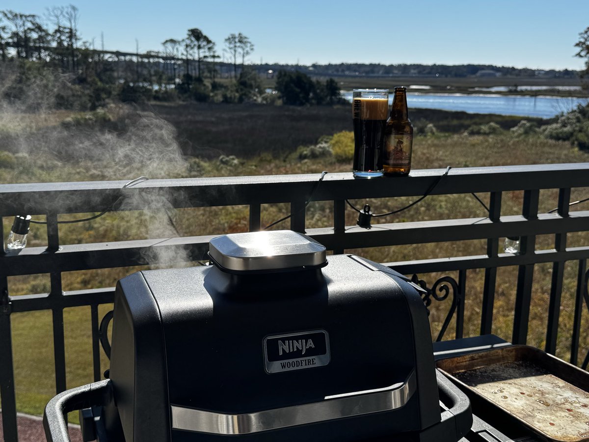 Smoking a shoulder and enjoying a <a href="/foundersbrewing/">Founders Brewing Co.</a> CBS at the beach.