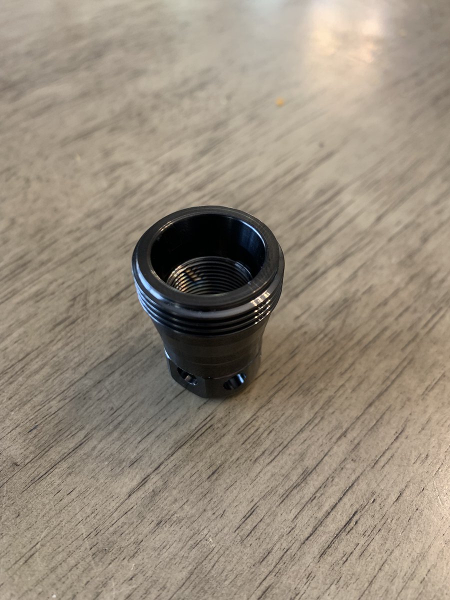 MunkworksMike's tweet photo. Another cool part. DLC coated titanium muzzle brake. https://t.co/TjmCeGVikM