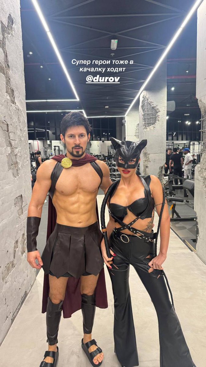 Pavel Durov as Spartan Warrior & Girlfriend as Catwoman