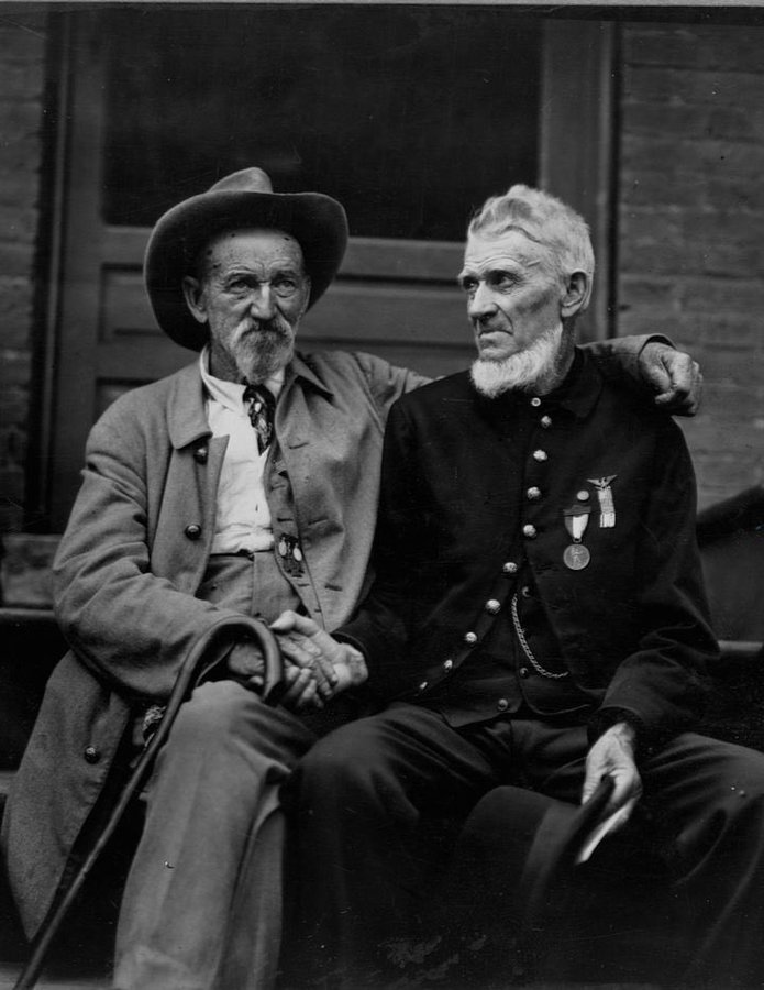Civil War vets shaking hands in 1913. Reconciliation is always possible to those with good faith.