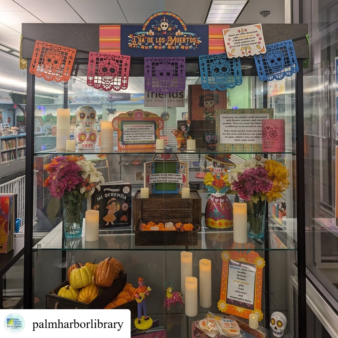 #repost @palmharborlibrary It's Día de los Muertos! Come see our Children's room display full of books, flowers and information about Day of the Dead! #DiaDeLosMuertos
