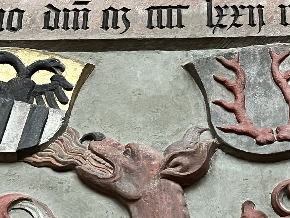 type_alchemy's tweet image. Broken Script were widespread  throught Europe in the Middle Ages. The example Schoß a butiful and cleany chiseled Script. Leon and dog symbolize power and loyalty. Cathedral, Frankfurt am Main.