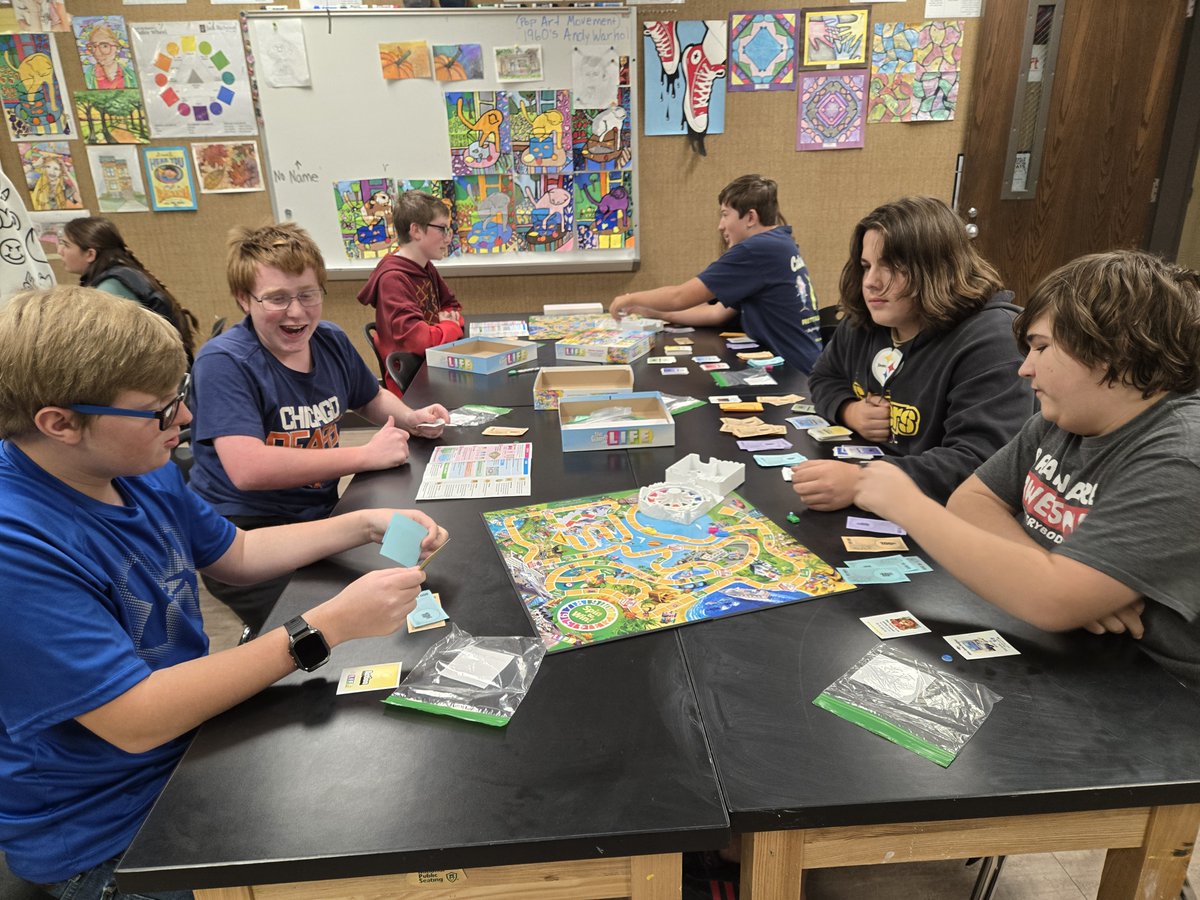 Mrs. Saathoff's 8th Grade Preparing for College &amp; Careers Class Students Playing the Game of Life - Great way to apply many of the skills they are learning in class.  8th graders earn a high school credit for this class. #WeAreMG