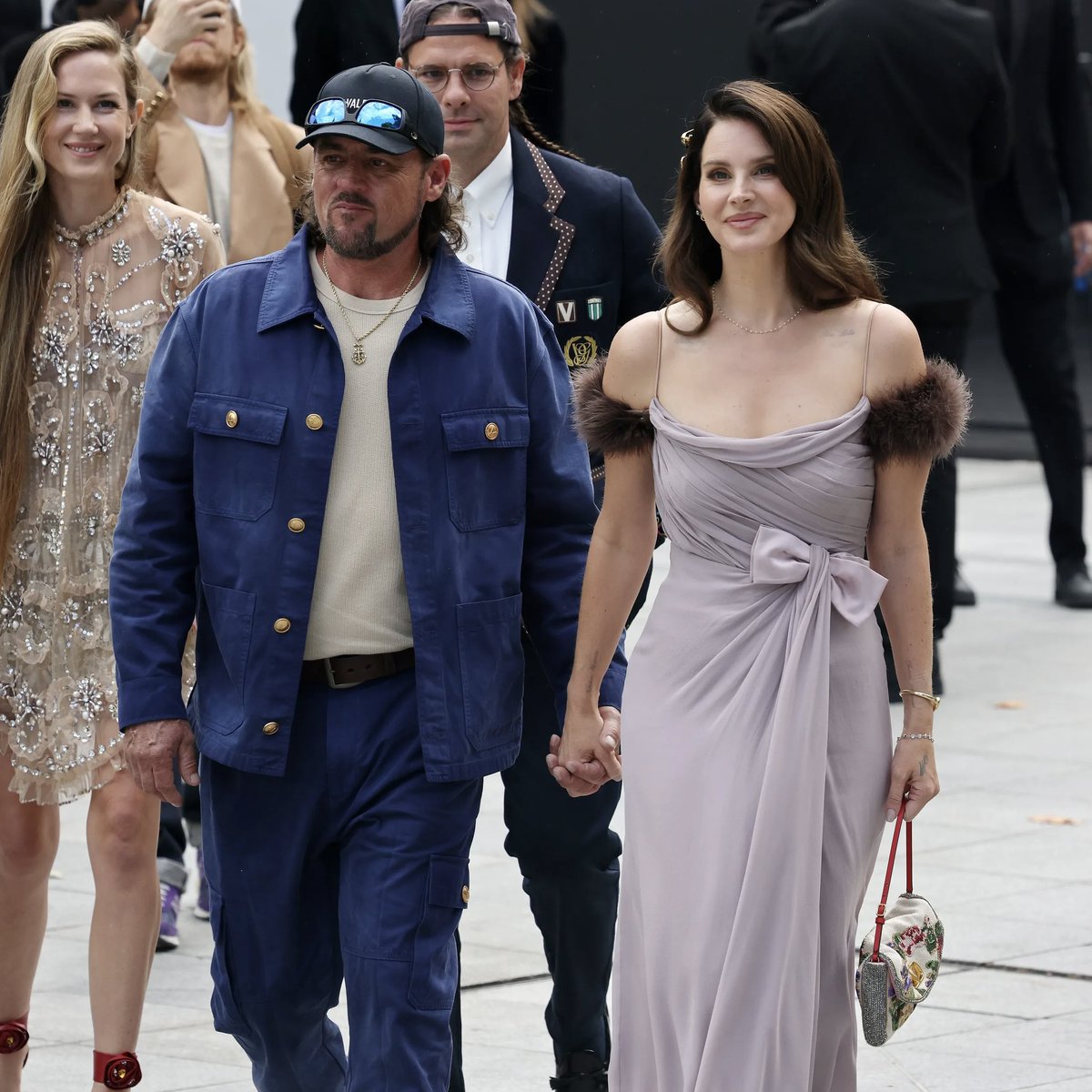 I hate gay Halloween what do you mean we are Lana Del Rey and her husband at the SS26 Valentino show