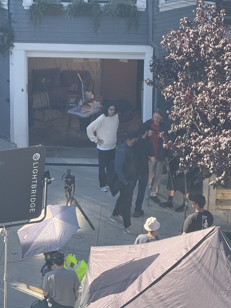 nbt's tweet image. Our block in Potrero Hill was taken over by a film crew today. Putting the pieces together, pretty sure this is a sneak peek of the next OpenAI commercial