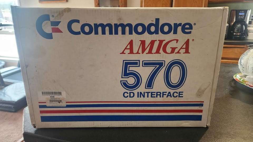 Here is a rare piece of Commodore Amiga gear for sale on Facebook Marketplace... CD-ROM for your Amiga 500! This is a sweet piece of Amiga history, but is way out of my budget so I am sharing here in case someone else wants to add to their collection.

The Amiga A570 (also known