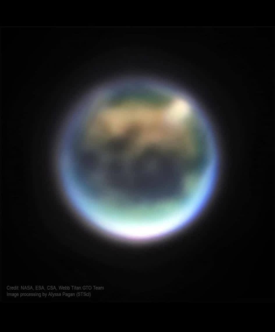🚨: This is NOT a blurred photo of Earth. 

It’s Saturn’s largest moon Titan and the only other known world with liquid on its surface. 

Captured by James Webb Telescope 🤩