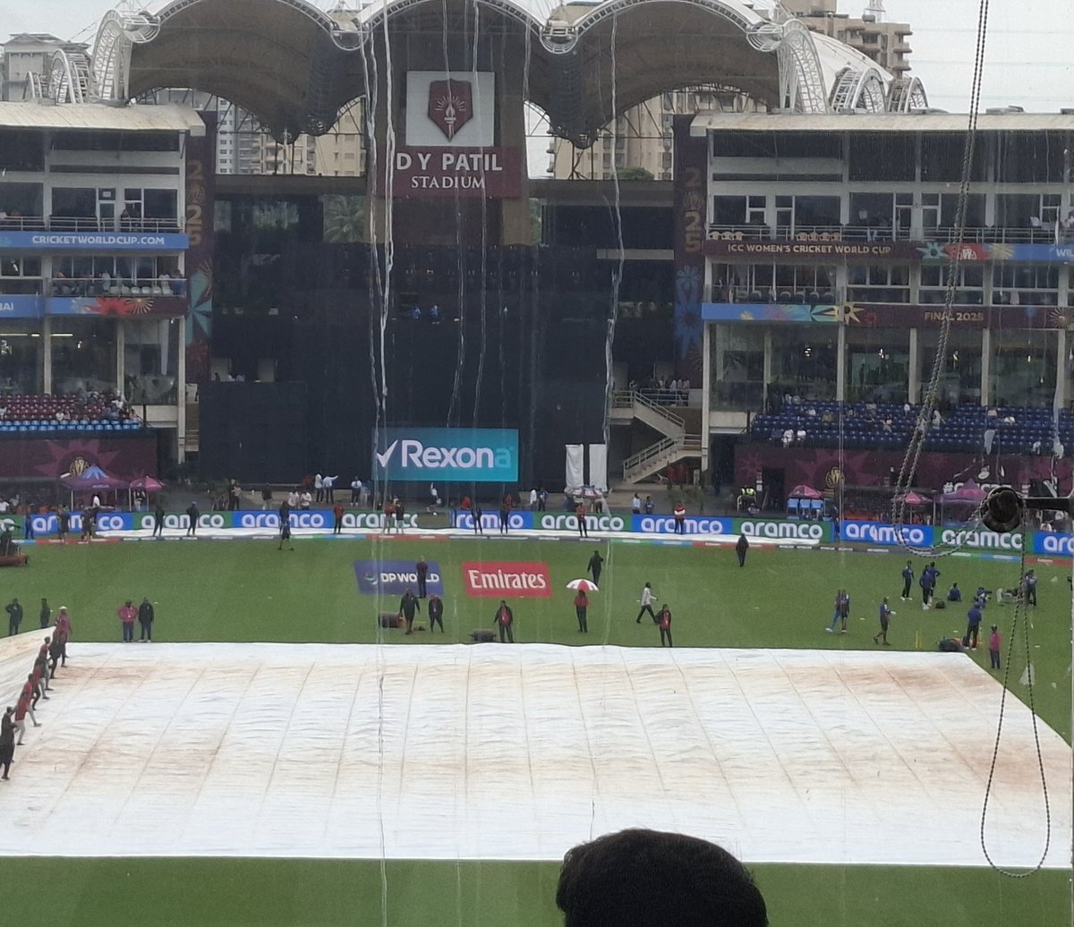Players warming up even as they bring  the covers back. That kind of day #CWC25