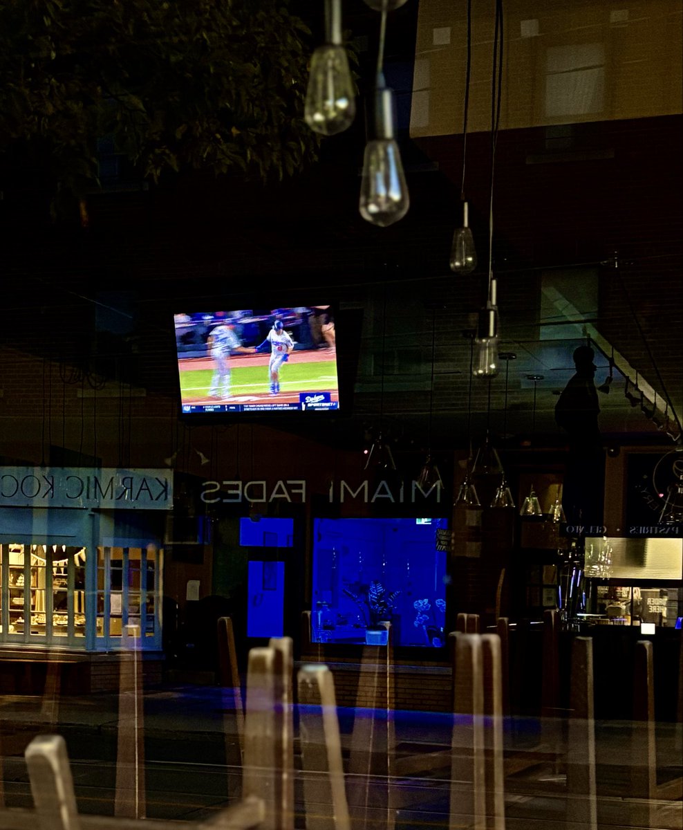 Heartbreak on repeat in a closed bar at dawn.