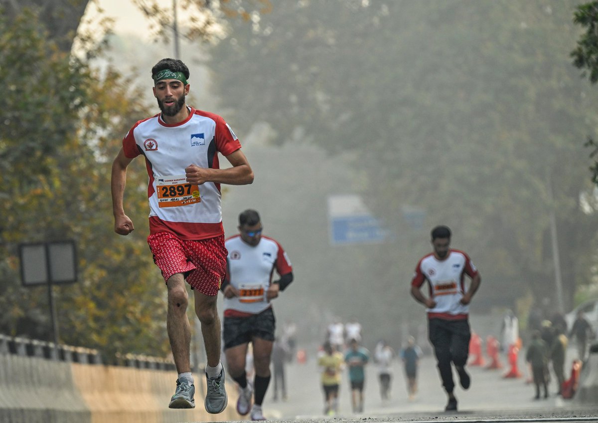 A participant running in the field during the 2nd edition of the Kashmir Marathon on 2nd November 2025. The marathon witnessed an enthusiastic turnout and celebrated the spirit of sports and unity.