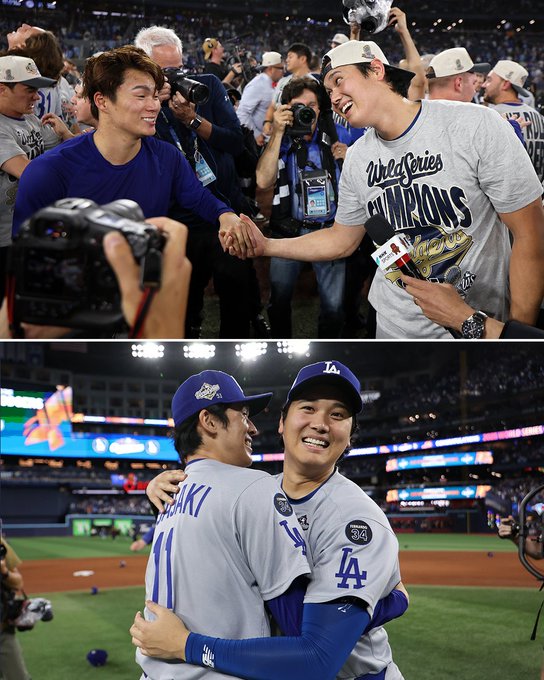 First image shows a group of people including photographers and fans surrounding two smiling men in casual clothing, one wearing a gray World Series t-shirt, shaking hands and posing with badges. Second image depicts two players in Dodgers uniforms, one with number 11 on gray jersey labeled Ohtani, the other in blue, embracing on the baseball field near the dugout with stadium lights and flags in the background.