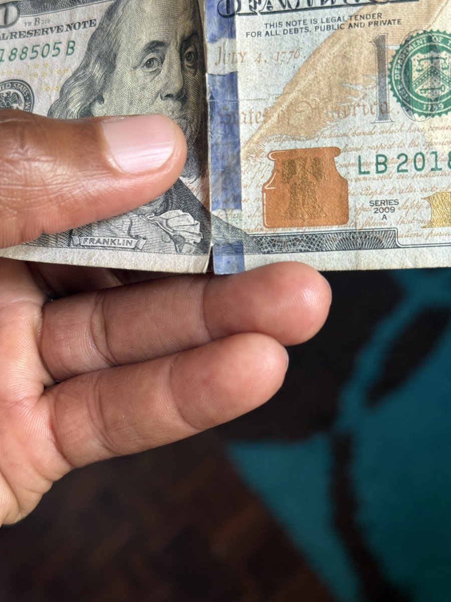 NMMachaka's tweet photo. I feel this needs a discussion. 
So @PicknPay Braeside yesterday declined accepting this US $100 bill because of that 4mm tear which naturally occurs along the 3D security ribbon during circulation. Their reason being @CBZHoldings will consider it a soiled note &amp; charge them. https://t.co/IlFGAKC0HX