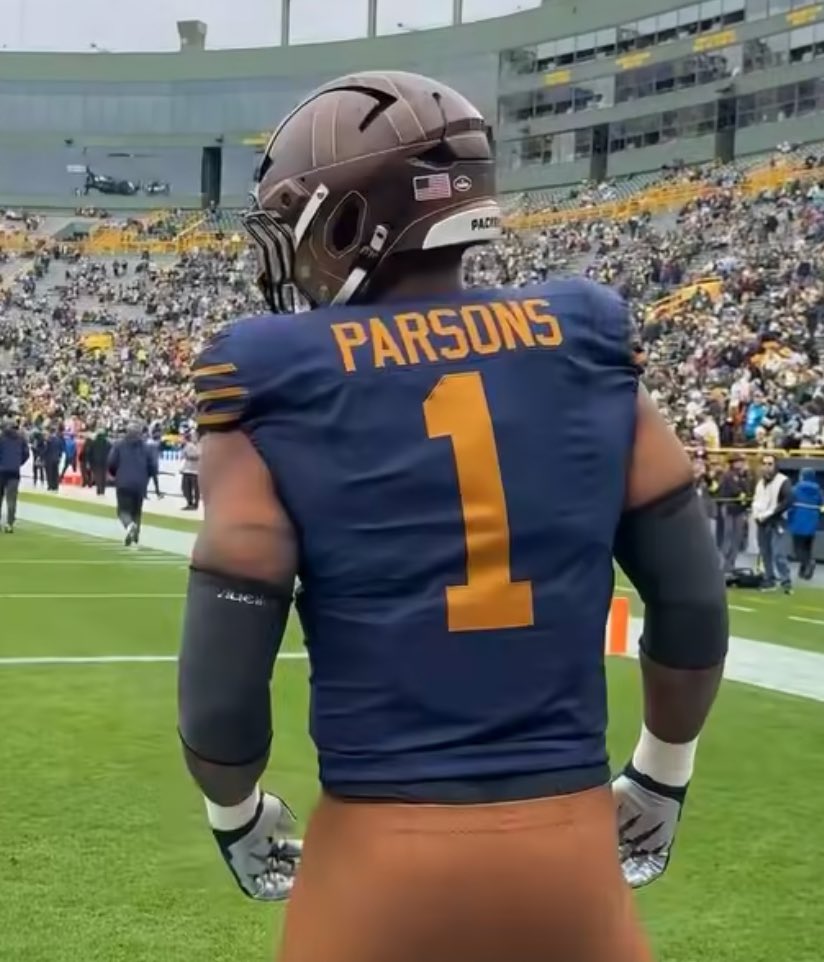Curly Lambeau's number in a Curly Lambeau uniform.