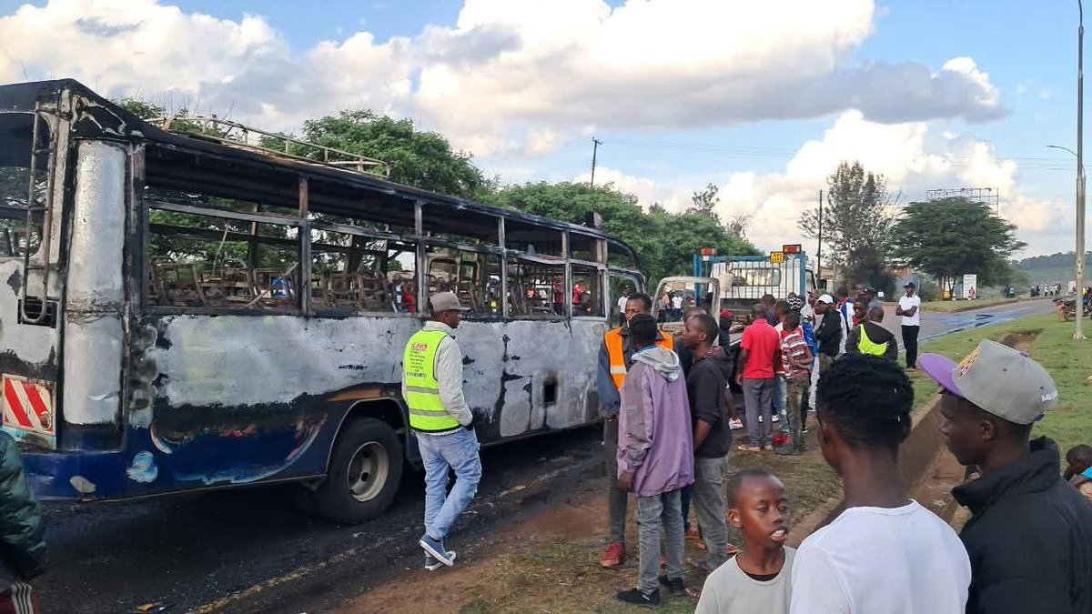 SokoAnalyst's tweet photo. A tragic and deeply disturbing incident  unfolded at Juja High Point. A Lopha Sacco bus was set ablaze after its conductor reportedly threw out a stage attendant — commonly known as a kamagira — from the moving vehicle.

Witnesses say the man was simply demanding his rightful KSh 20 after helping the conductor fill the bus at the stage. In a shocking act of inhumanity, he was pushed out while the vehicle was still in motion, hit the ground, and tragically died on the spot after sustaining fatal head injuries.

Police have since collected the body, while firefighters are working to extinguish the burning vehicle.

As a country, we must pause and reflect. How did we get here — to a place where life is worth less than twenty shillings? This kind of cruelty is beyond comprehension and should jolt us into questioning the moral decay eating away at our society.