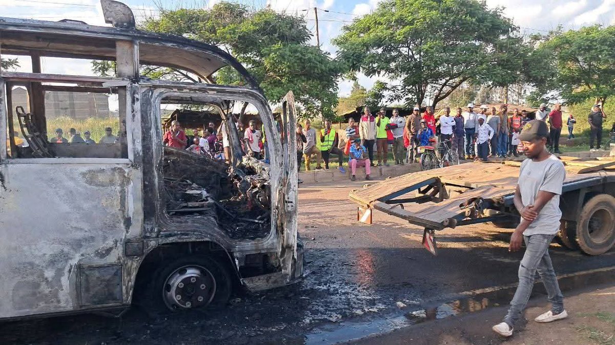 SokoAnalyst's tweet photo. A tragic and deeply disturbing incident  unfolded at Juja High Point. A Lopha Sacco bus was set ablaze after its conductor reportedly threw out a stage attendant — commonly known as a kamagira — from the moving vehicle.

Witnesses say the man was simply demanding his rightful KSh 20 after helping the conductor fill the bus at the stage. In a shocking act of inhumanity, he was pushed out while the vehicle was still in motion, hit the ground, and tragically died on the spot after sustaining fatal head injuries.

Police have since collected the body, while firefighters are working to extinguish the burning vehicle.

As a country, we must pause and reflect. How did we get here — to a place where life is worth less than twenty shillings? This kind of cruelty is beyond comprehension and should jolt us into questioning the moral decay eating away at our society.