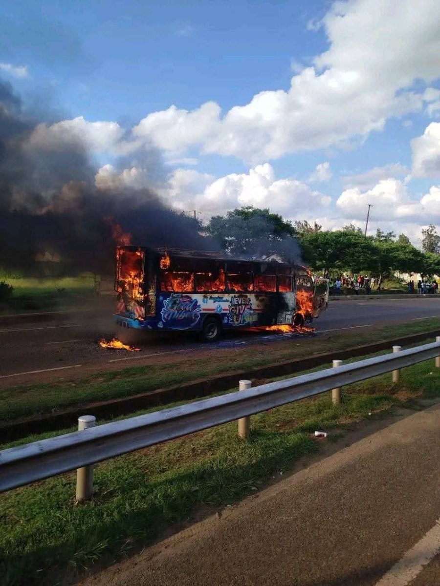 SokoAnalyst's tweet photo. A tragic and deeply disturbing incident  unfolded at Juja High Point. A Lopha Sacco bus was set ablaze after its conductor reportedly threw out a stage attendant — commonly known as a kamagira — from the moving vehicle.

Witnesses say the man was simply demanding his rightful KSh 20 after helping the conductor fill the bus at the stage. In a shocking act of inhumanity, he was pushed out while the vehicle was still in motion, hit the ground, and tragically died on the spot after sustaining fatal head injuries.

Police have since collected the body, while firefighters are working to extinguish the burning vehicle.

As a country, we must pause and reflect. How did we get here — to a place where life is worth less than twenty shillings? This kind of cruelty is beyond comprehension and should jolt us into questioning the moral decay eating away at our society.