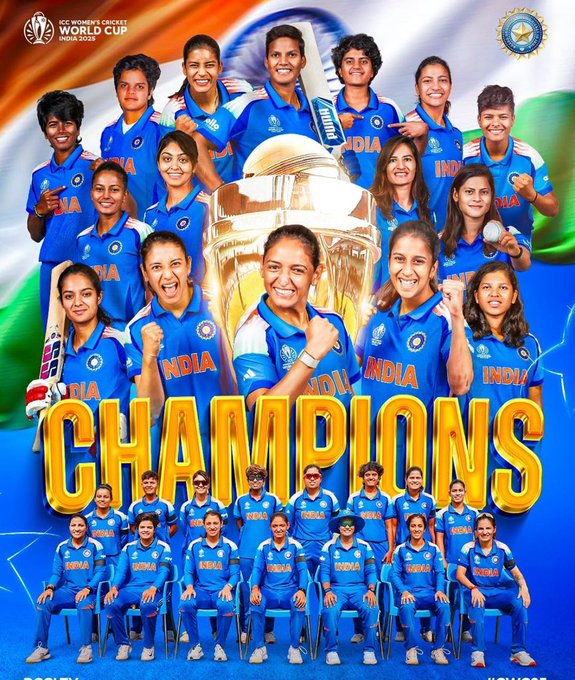 A group of young women in blue Indian cricket uniforms with white and blue accents stand together on a field, some holding cricket bats, others smiling and posing dynamically. In the center, a large golden trophy shaped like a world cup is prominently displayed. The background features the Indian flag waving. Text overlays include CHAMPIONS in gold letters and INDIA repeated. The ICC Womens World Cup logo is at the top.