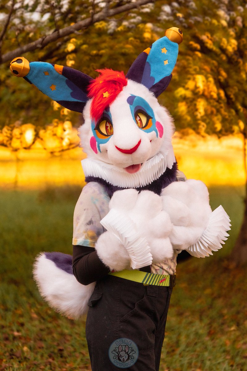Next up is another fun critter who I've had on the backburner forever! A cute jester hare! His ears wiggle and the 3D printed bells are attached via magnets! His hair and nose is UV reactive fur! Such a fun design made by slumberyote!