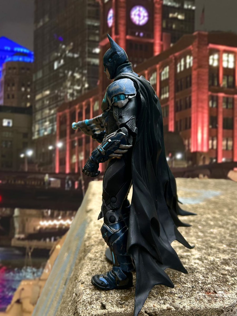 patrickjesson's tweet image. I repainted the McFarlane Toys Arkham Knight Batman. I edited in pictures of Chicago that I took.  Also used fluorescent paint so ho glows under a blacklight.  Wasn’t going for game accuracy lol.  Just making him look cool #batman #arkhamknight #mcfarlanetoys #customactionfigures