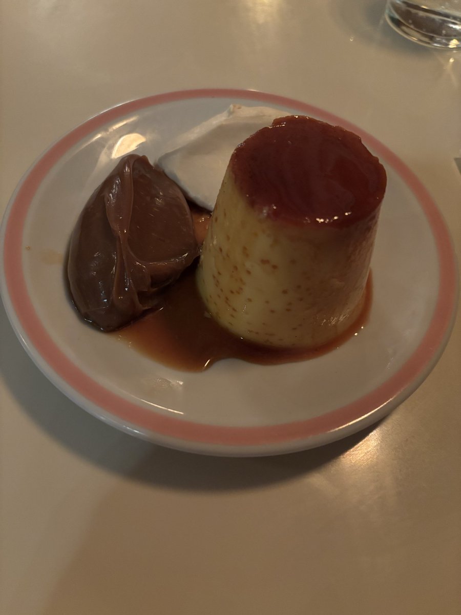 It’s one a.m. and I’m eating flan with a giant dollop of dulce de leche. This is my best life.