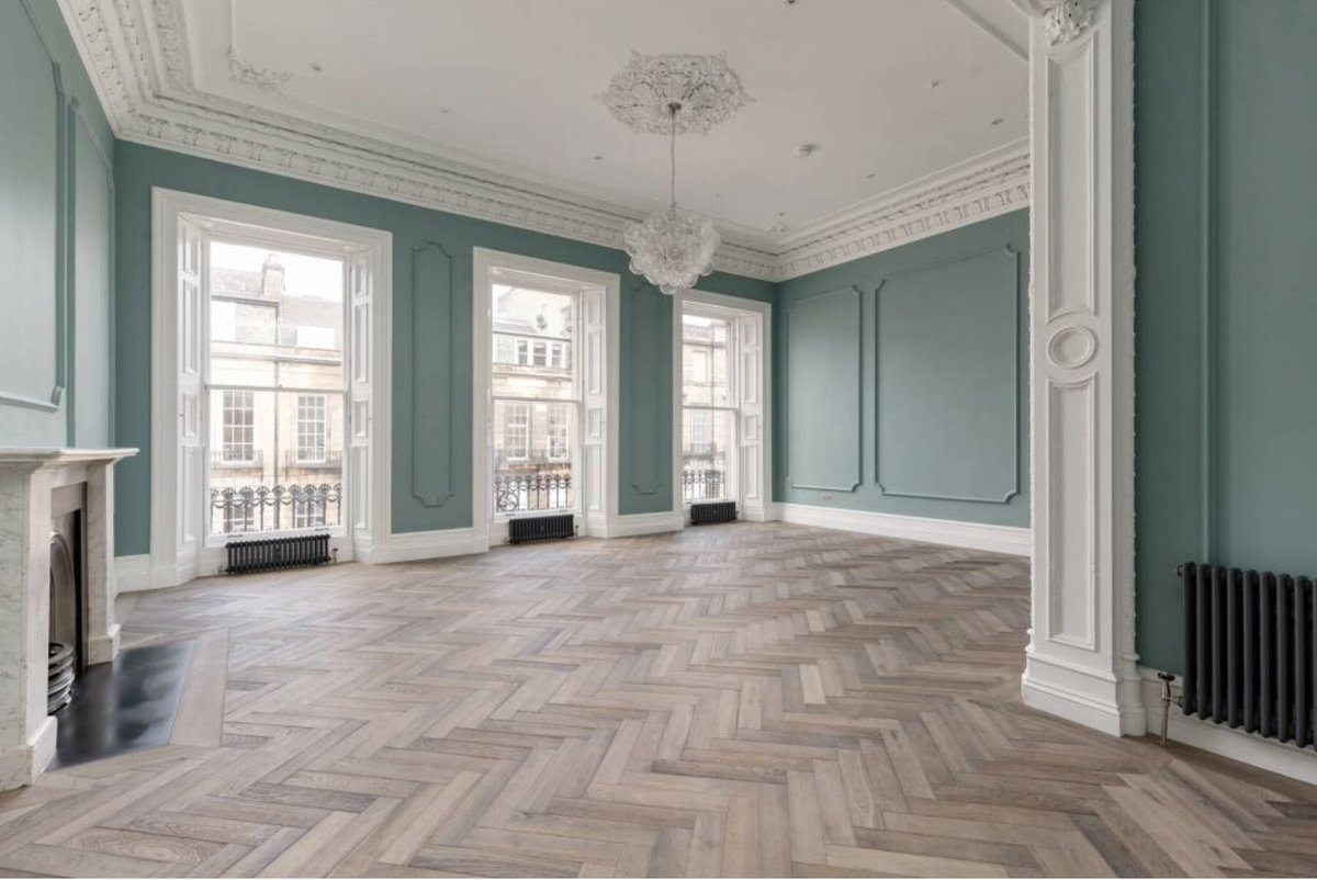 Edinburgh during the Scottish Enlightenment:
 urban planner James Craig uses the power of the state to create the regulatory conditions that lead developers to build stone, multi-family buildings around the perimeters of a street grid, so residents have access to active public