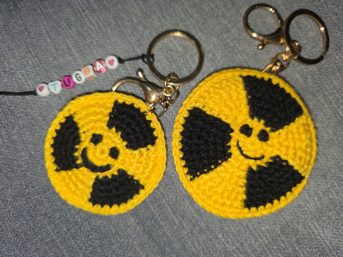 yiltuug's tweet image. Who said hazardous signs can’t be cute? 😅
I was gifted these tiny, radiation-signed knitted #keychains — soft, squishy, and a little #radioactive-chic.
Who knew safety symbols could be this adorable? 😌💛☢️🧶 #radonc