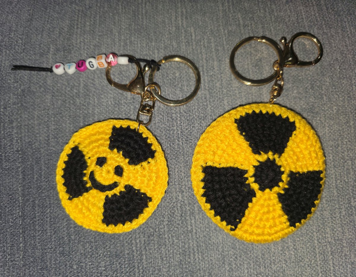 yiltuug's tweet image. Who said hazardous signs can’t be cute? 😅
I was gifted these tiny, radiation-signed knitted #keychains — soft, squishy, and a little #radioactive-chic.
Who knew safety symbols could be this adorable? 😌💛☢️🧶 #radonc