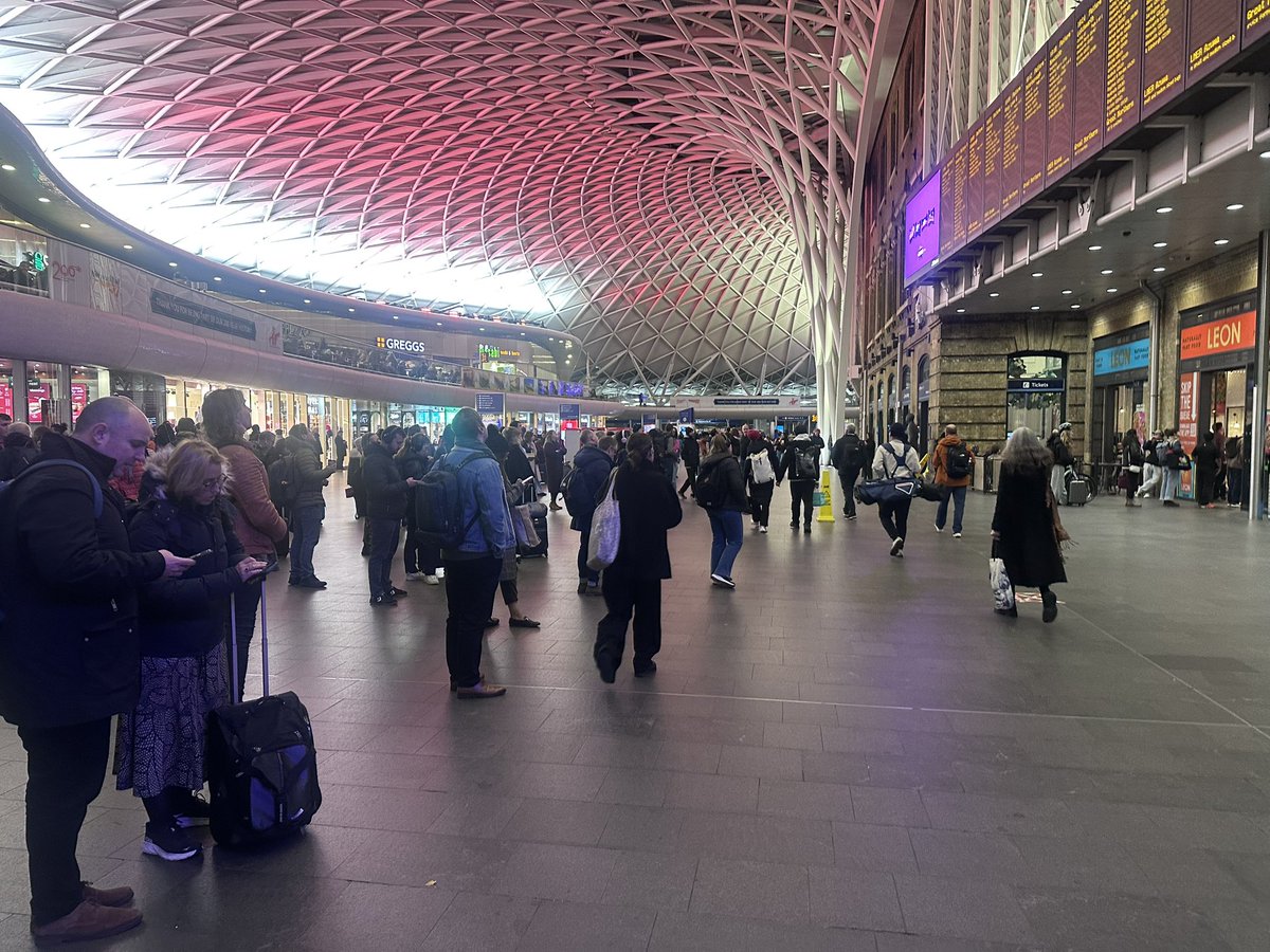 TheDavidAshton's tweet photo. Faithful disciples praying to you the god of platform assignment

#kingscross #funny https://t.co/V9N8EEjbbA