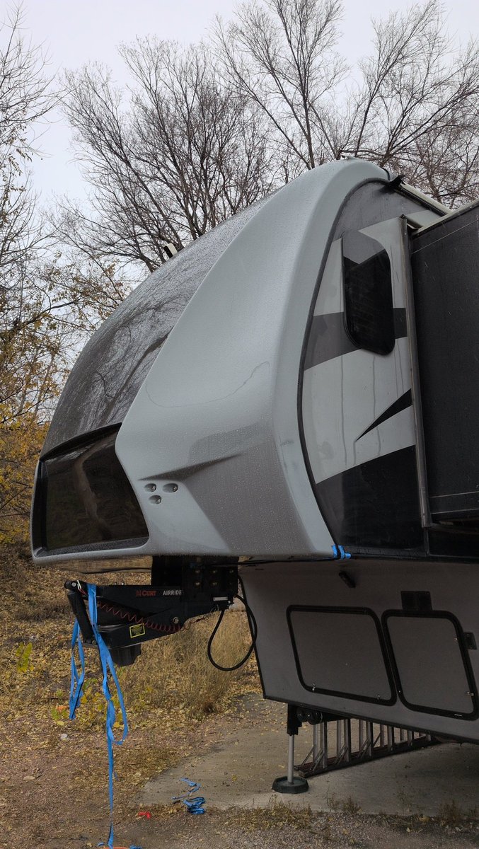 Holy crap it's cold! And very very wet! And windy.

The instructions on the dicor did say to install at 40 deg F or greater. And it is 41 deg, so, winning! Sadly it also indicates it becomes waterproof in 4 hours. But the good news is that at 41 deg, it skins up in about 10