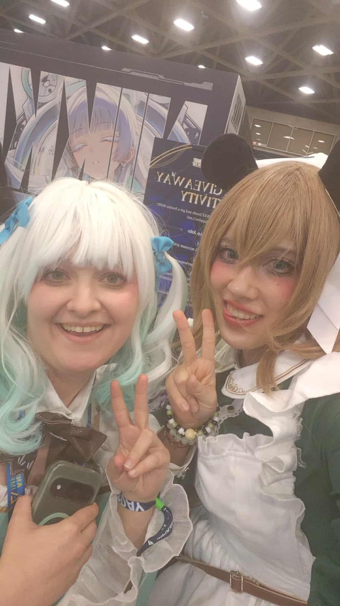 Beautiful women booth at #AnimeImpulse #NIKKE #NIKKE3rdAnniversary