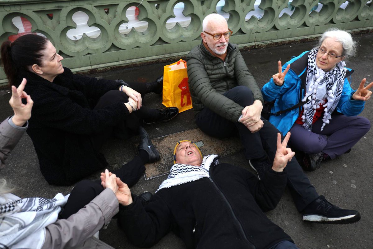 BREAKING: Five arrested under the Terrorism Act after they unfurled a banner on Westminster Bridge which read:

'We support the hunger strikers. We support Palestine Action'
