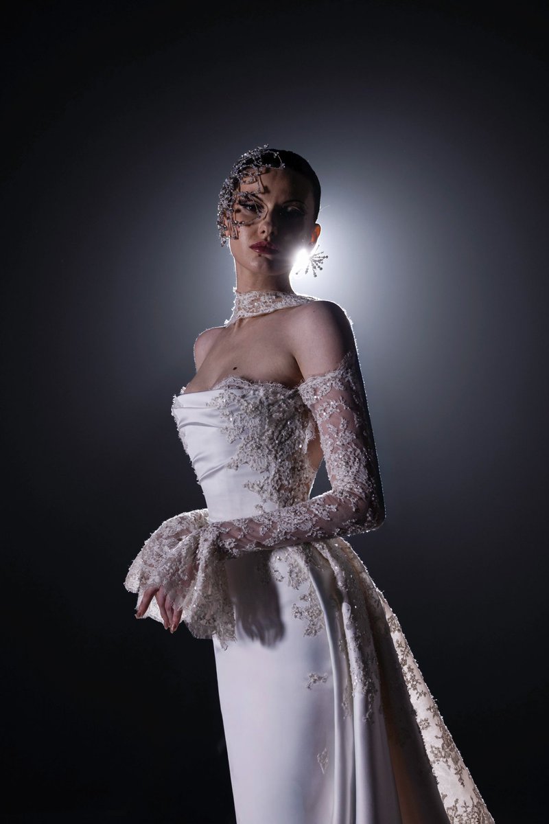 mikhailchamoun's tweet photo. The interplay of lace and hand-placed beadwork brings depth and softness to the silhouette, revealing elegance in every detail.

#MIKHAILBridal https://t.co/GgVs43bBnn