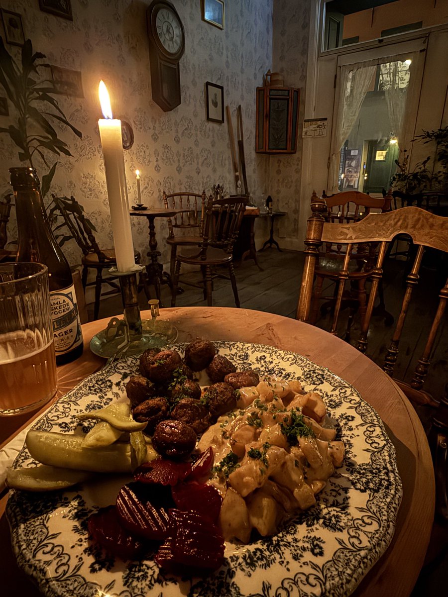 TheDanKingerski's tweet image. Moose meatballs. Some potatoes. Pickled beets and a plate of pickles in the coziest spot I’ve ever been. Old Town Stockholm.