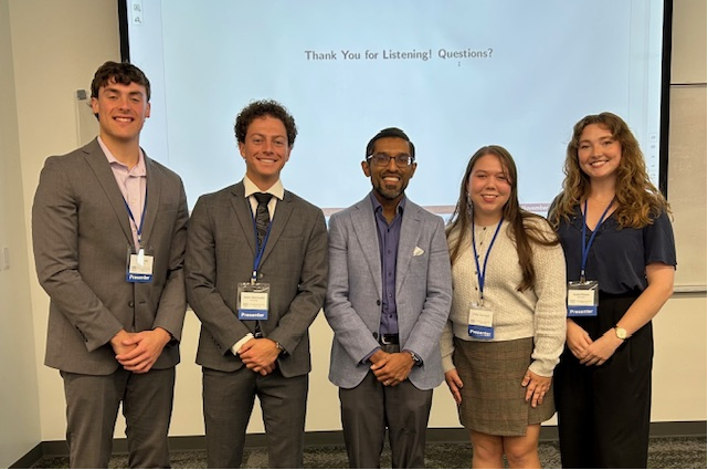 BerryEconRocks's tweet photo. Kudos to econ majors Aiden Benoualid, Nico Koch, and Susie Peters for their outstanding presentations earlier today in Berry's Student Research and Creativity conference. (Pictured with President Mazumder and CRT presenter Jessica Hawxhurst.) https://t.co/wbgRLA4j85