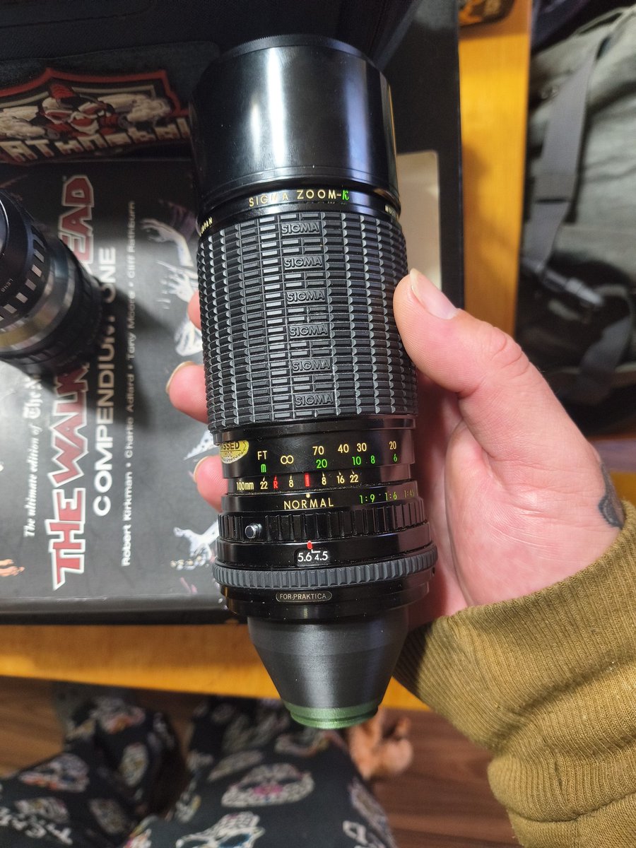 M42 to c-mount was the correct Answer. Old school lens for 20 buck Sigma zoom-k 100-200