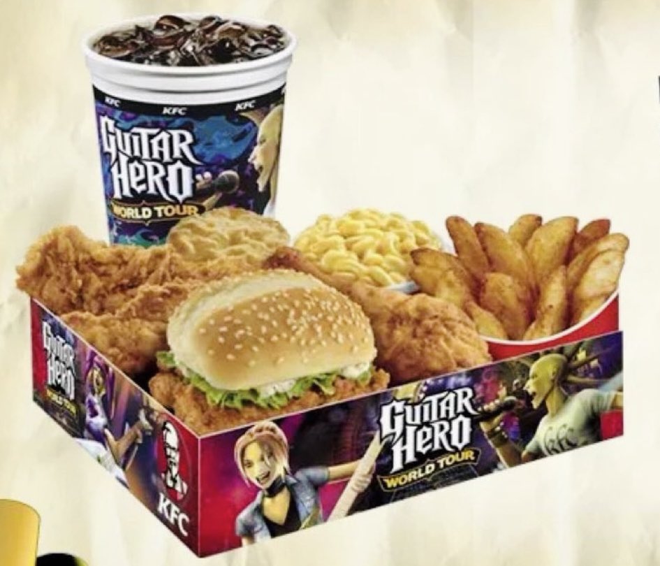 ReddCinema's tweet image. need kfc guitar hero meal from 2009 so bad