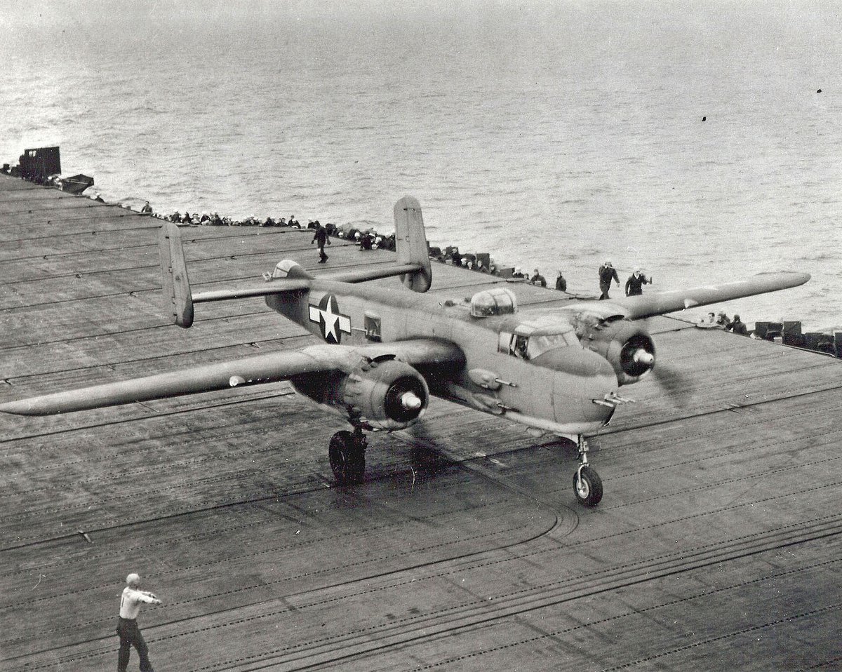 PBJ-1H Mitchell strafer bomber on the flight deck of USS Shangri-La off Chesapeake Bay during trails to judge the suitability of the Mitchell as a carrier aircraft, 15 Nov 1944. It was not adopted and no further tests were done.