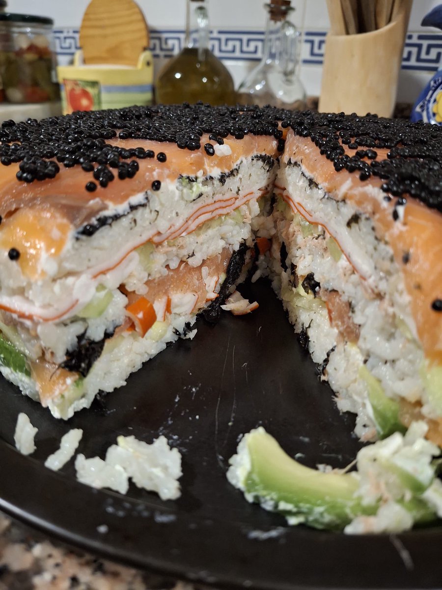 tekbog's tweet image. my dad said he made a sushi cake??