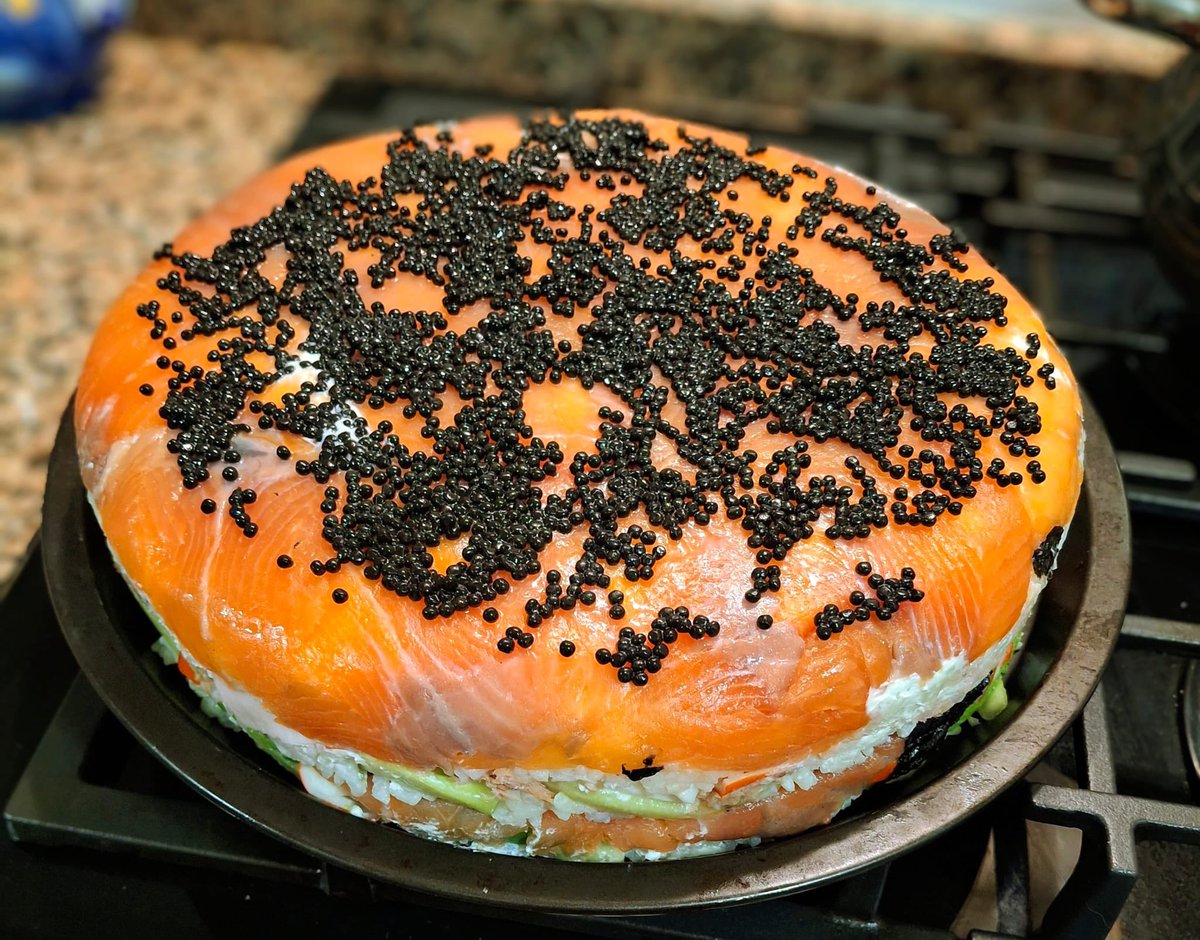 tekbog's tweet image. my dad said he made a sushi cake??