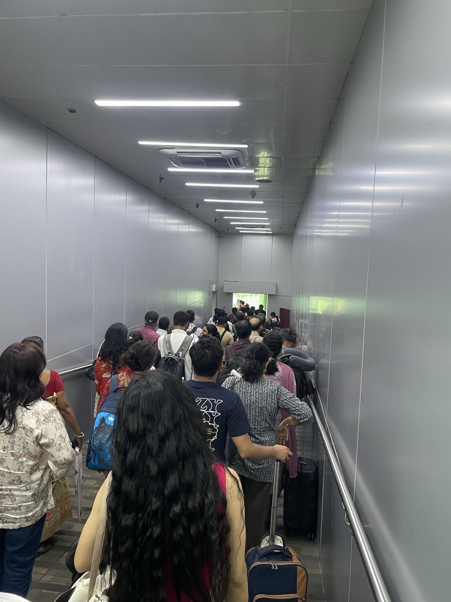 rabibrata's tweet photo. @IndiGo6E never seen such a terrible boarding experience today like 6E 6326 Gate 1 Chennai to CCU. Double line even inside the aerobridge. https://t.co/ho3EjPnXJi
