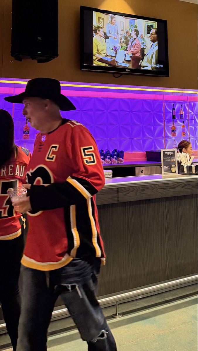 This is how sad Flames games have become. A PBS soap opera is on one of the screens above the bar. They don’t want Flames fans to see a real hockey game. #flames #sadflames   @nhlflames