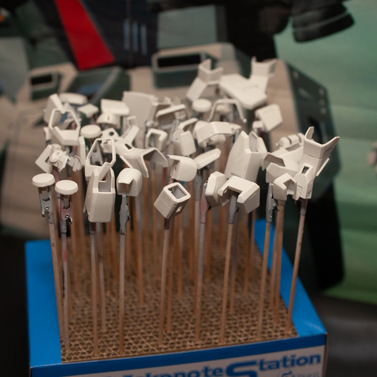 Saturday_Anime's tweet image. Organize things based on core colors. I have a station, like the one below, that I keep part ready to paint on. 

Once I start building up coats of paint onto them, I move them to another to dry. That helps me keep track of what I&apos;ve done. Then, I just cycle through as needed.…