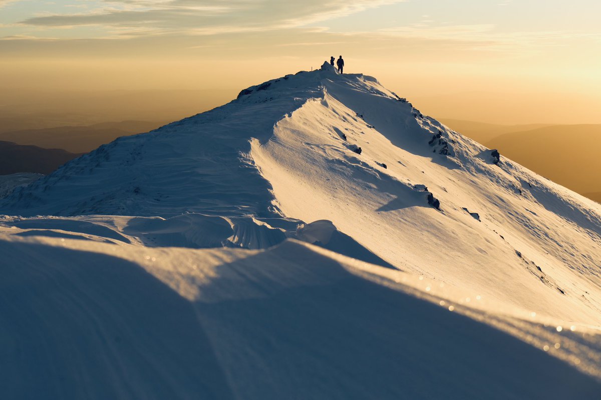 A Ben Vorlich sunrise earlier today. The young lad in the photo whooped as the sun broke over the horizon, his first ever sunrise Munro.